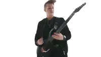 a man in a black jacket is playing a black electric guitar .