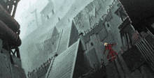 a man in a red dress is standing in front of a building with a triangle on it