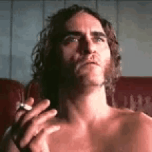 Inherent Vice Joaquin Phoenix GIF - Inherent Vice Joaquin Phoenix Smoke GIFs