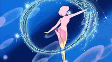 a woman in a pink dress is surrounded by a blue ring