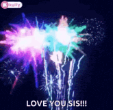a fireworks display with the words `` love you sis '' written in the middle .
