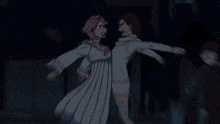 a woman in a white dress is fighting another woman in a pink dress