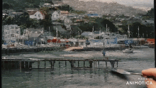 a painting of a harbor with boats and houses made in animatica