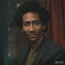 a man in a suit says i erased it in a netflix advertisement