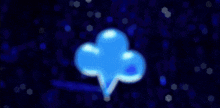 a blue cloud is glowing in the dark with rain drops
