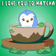 a penguin is in a cup of matcha tea
