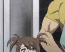 a girl with pigtails is being held by a man