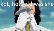 a man in white gloves is holding a sword with the words kot how old was sho written below him