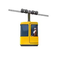 a yellow cable car with a man in it