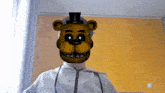 a man is wearing a mask of a teddy bear