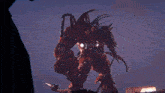 a person is holding a large sword in their hands