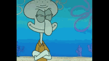 squidward from spongebob squarepants is standing on a beach with his arms crossed .