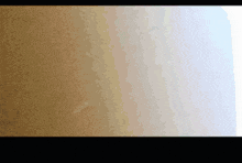 a brown background with a white border and a blue border
