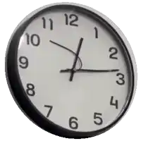 a black and white wall clock shows the time as 4:20