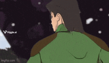 a cartoon of a man wearing glasses and a green shirt is smiling .