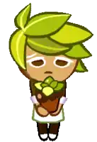 a cookie from a video game holding a potted plant .