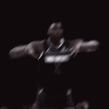 a blurry picture of a man wearing a jersey with the number 87 on it