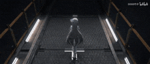 a girl with long black hair is standing in a dark room with a sign that says dddd on it