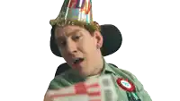 a man wearing a party hat and a badge that says ' i love you '