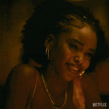 a woman with a netflix logo on the bottom of her face