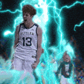 a man wearing a butler jersey with the number 13