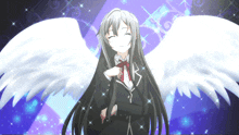 a girl with long black hair and white wings stands on a stage