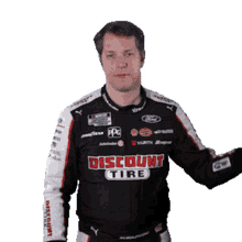 pointing left brad keselowski nascar to the left over there
