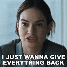 a woman says " i just wanna give everything back " in front of her face