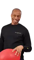 a man wearing a black shirt that says bdm streams is smiling
