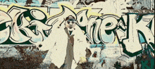 a drawing of a man standing in front of graffiti that says " carlos "
