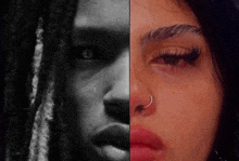 a black and white photo of a woman with dreadlocks and a nose ring