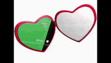 a heart shaped mirror that says " don 't say a word "