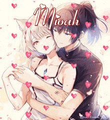 a boy and a girl are hugging and the girl has the name mioah on her head