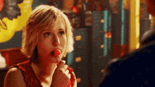 Chloe Sullivan Smallville GIF - Chloe Sullivan Smallville Lollipop GIFs