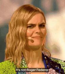 a woman says it 's not roger federer on a screen