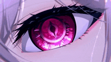a close up of a person 's eye with a purple circle in it