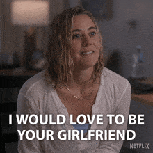 a woman in a white shirt is smiling and says i would love to be your girlfriend