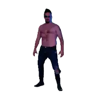 a man without a shirt is dancing with his arms outstretched