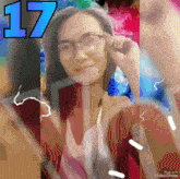 a woman wearing glasses and a hat with the number 17 above her head