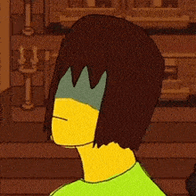 a cartoon character with a crown on his head is wearing a green shirt and a yellow shirt .
