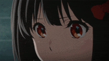 a close up of a girl 's face with a red flower in her hair