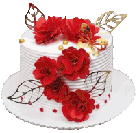 a white cake decorated with red flowers and gold butterflies