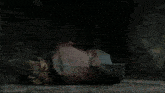 a person laying on the ground with a knife in their chest
