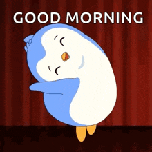 a penguin is dancing in front of a red curtain with the words `` good morning '' written above it .