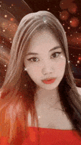 a close up of a woman 's face with long hair and red lips