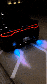 a black car with a texas license plate that says bgx-8425