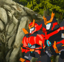two transformers are standing next to each other in front of a rock wall