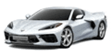 a white sports car is sitting on a white surface .