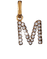 a gold letter m pendant with diamonds on it