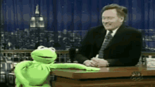Conan Kermit The Frog GIF - Conan Kermit The Frog Dog With A Gun GIFs